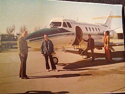 DEW (left) oversees preparations for his trip with his employees. One of several B&R, Inc. learjets.